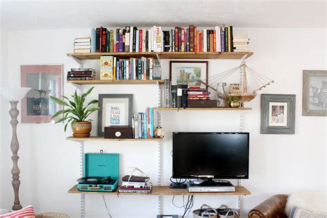 They don't require much space and don't make the space look cluttered. DIY Open Shelving Living Room Unit
