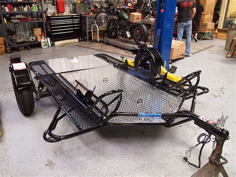 A motorcycle trailer is a great way to transport your bike for long distances in an enclosed space. South Bay Street Machines: 2013 Kendon Dual Motorcycle Trailer