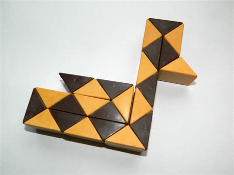 A snake cube is a puzzle composed of a chain of cubelets, connected by an elastic band running through each cubelet. Pin op My 80's Teenage Memories