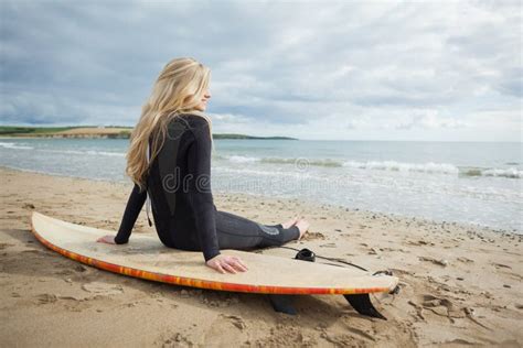 Smiling Beautiful Blond In Wet Suit With Surfboard At Beach Stock Image Image Of Slim Hobby