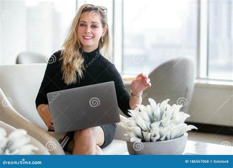 Cheerful Sophisticated And Classy Successful Entrepreneur Working Online Remotely With Laptop