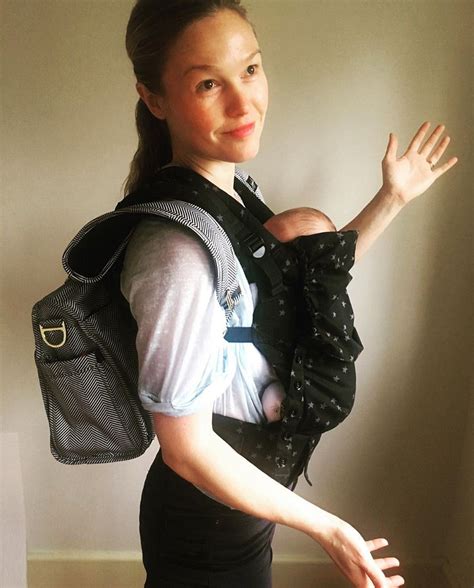 Julia Stiles Shows Off Newborn Son Strummer In Tula Carrier