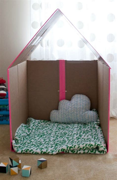 Turn A Plain Cardboard Box Into A Super Cool Playhouse With This Easy