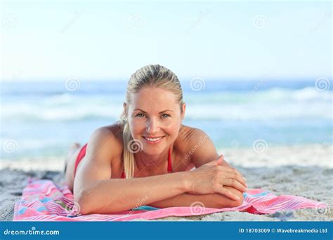 Beautiful Woman Lying Down On The Beach Stock Image Image Of Lovely Blonde 18703009