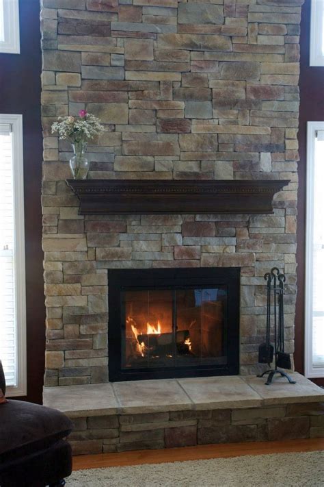 These stacked stone fireplace ideas. modern fireplace designs with glass and floating shelf