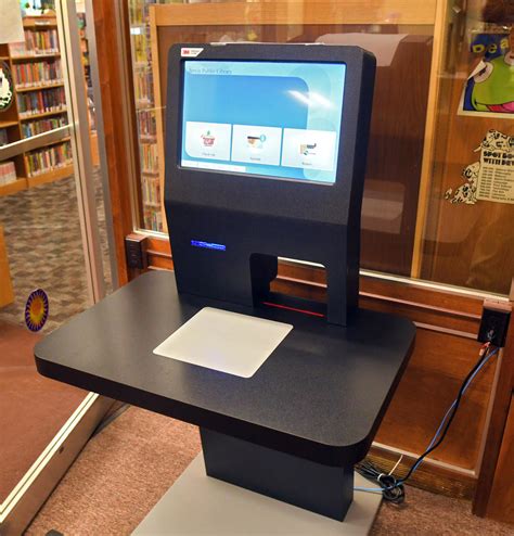 Jervis Library Checks Out Self Checkout Terminal Daily Sentinel