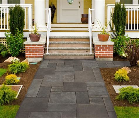 Using a concrete base, outdoor slate tiles can be arranged in a beautiful pattern, creating a patio that will last for years. BuildDirect®: Slate Pavers Slate Pavers Royal Black | Slate pavers, Slate patio, Pavers