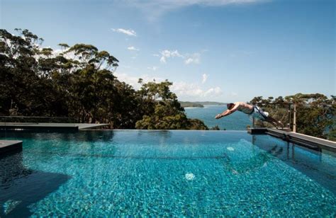 Bourne Blue Architecture Divides Dudley Residence Along Cliff Water