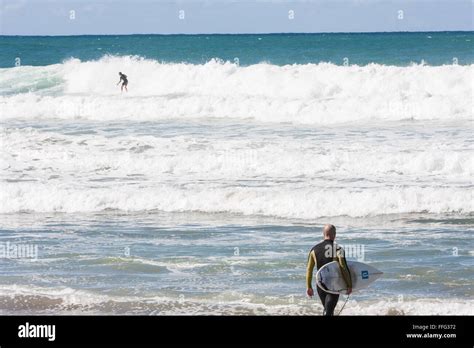 Surfers At Hot Water Beachmercury Baycoromandel Peninsulanorth