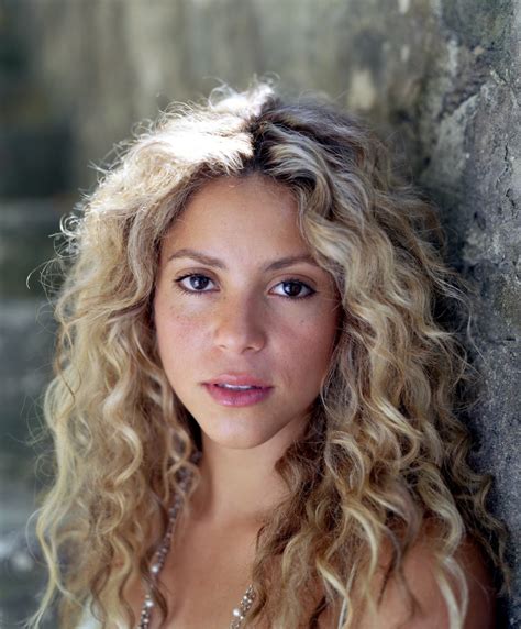 And preferably someone who wears tights or jeans cause it's cold. Shakira: shakira curly hair