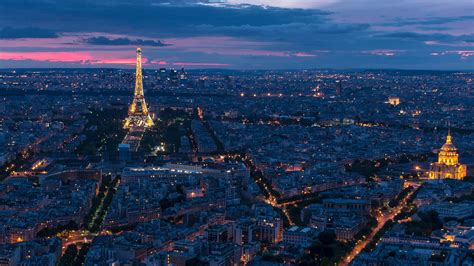 Paris City And Eiffel Tower With Glittering Lights With Background Of