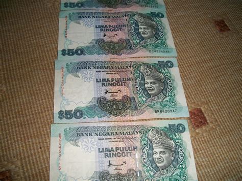 Duit peringatan sukan komanwel 1998 rm 50 ini disifatkan duit keluaran malaysia yang tercantik. collectible items: Duit Malaysia lama RM50 --- 5 pieces