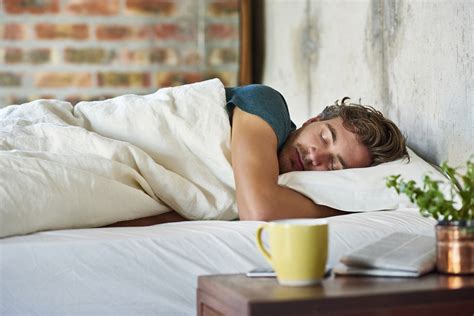 Young Man Sleeping In Bed At Home Humanitas Salute