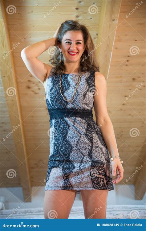 Young Seductive Woman In The Bedroom With Bed And Exposed Woode Stock Image Image Of Bright
