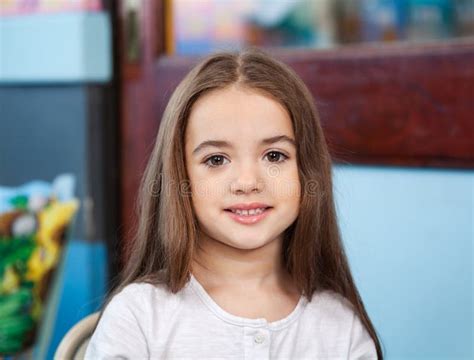 Cute Girl Smiling In Kindergarten Stock Image Image Of Classroom