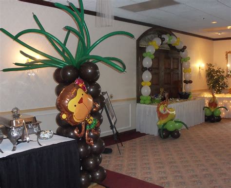 Use indoor plants, flowers, and large trees to make the perfect safari ambiance, use cool baby animal stuffed toys for your safari look. Baby Shower Gallery I | Animal baby shower theme, Jungle ...