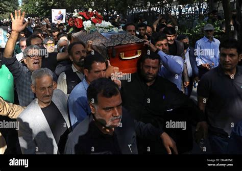 People Carry The Coffin Of Prominent Poet Houshang Ebtehaj During His