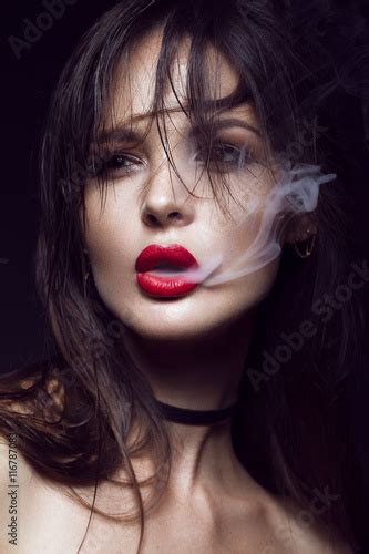 Beautiful Sexy Brunette Girl With Bright Makeup Red Lips Smoke From