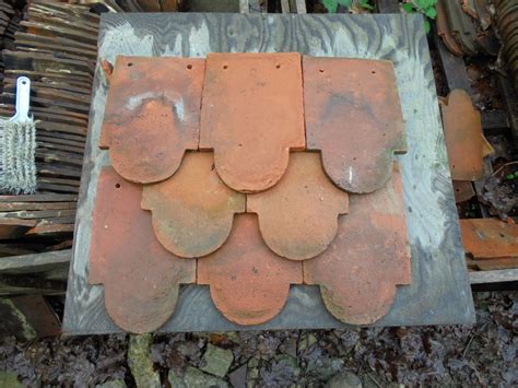 Hanging pictures & wall art. reclaimed ornamental hanging club tile - Authentic Reclamation
