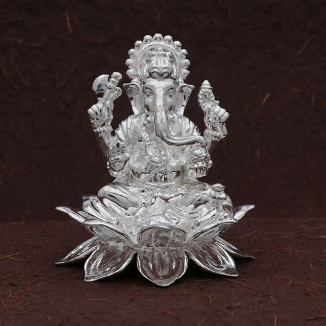 Silver Ganesh Idol On Lotus Eldorado