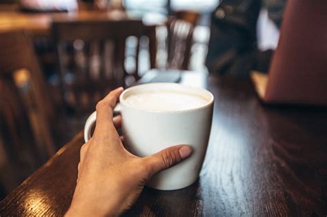 Download Coffee Cup In Hand Royalty Free Stock Photo And Image