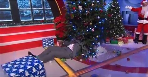 Shaq Getting Shoved Into A Christmas Tree Video Popsugar Celebrity