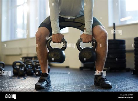 Kettlebell Lifting In Gym Stock Photo Alamy