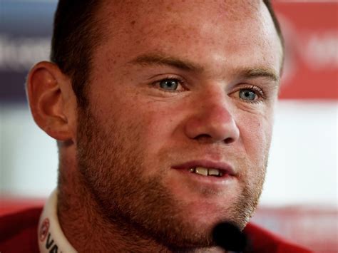 wayne rooney confirms that he wants to be manchester united captain but says he has no problem
