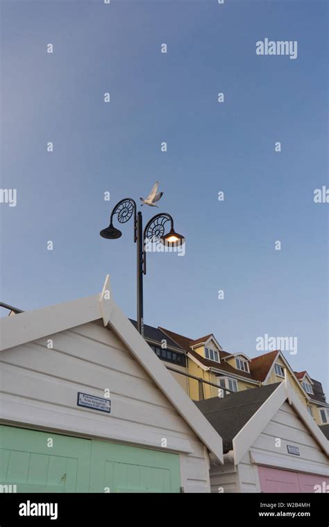 Lyme Regis Beach Huts And Lamp Posts Stock Photo Alamy