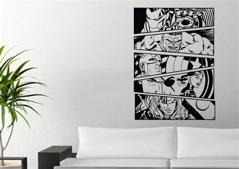 A Living Room With A White Couch And Black And White Artwork On The