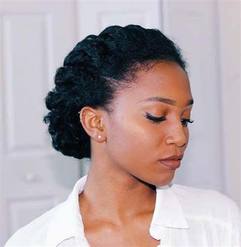 You can show off the gorgeous texture of your locks in a fancy half up half down 'do, styled into loose twists on top. HAIR STYLE FASHION