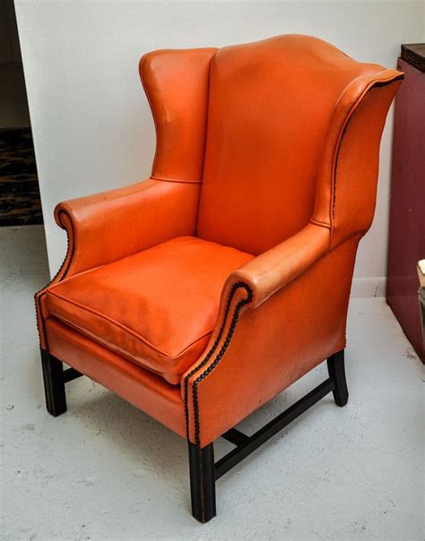 Shop the leather wingback chairs collection on chairish, home of the best vintage and used furniture, decor and art. Vintage Orange Leather Wing Chair image 2 | Leather wing ...