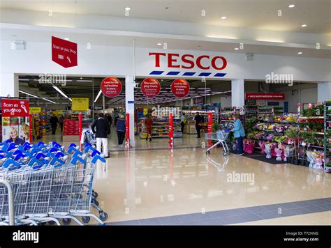 Entrance To Tesco Supermarket In A Shopping Mall Stock Photo Alamy