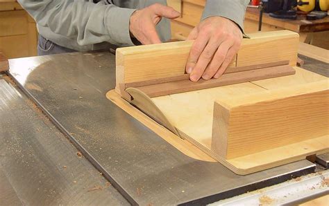 A drawer pull often includes a plate to which the handle is fastened. Making drawer pulls on the tables saw