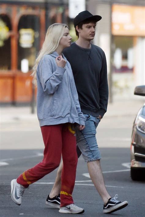 She started doing modeling at the age of 16. anya taylor-joy dresses down in a grey hoodie and red ...