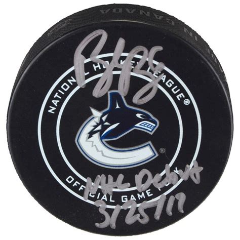 brock boeser vancouver canucks fanatics authentic autographed official game puck with nhl debut