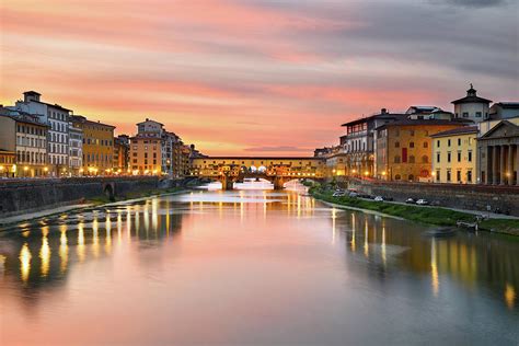 Cityscape At Ponte Vecchio Over Arno River At Sunset Florence Tuscany