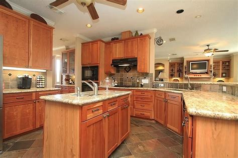 Oak cabinets are among the most highly recommended types of kitchen cabinets nowadays. tile floor, honey oak cabinets - Google Search | For the ...