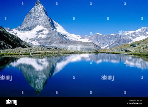 Reflection Of Mountain In Lake Mt Matterhorn Riffelsee Lake Zermatt