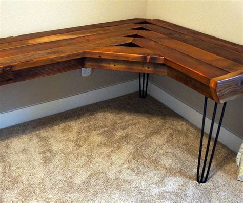 A Corner Desk Made Out Of Wood With Hair Pins On The Legs And Nails At