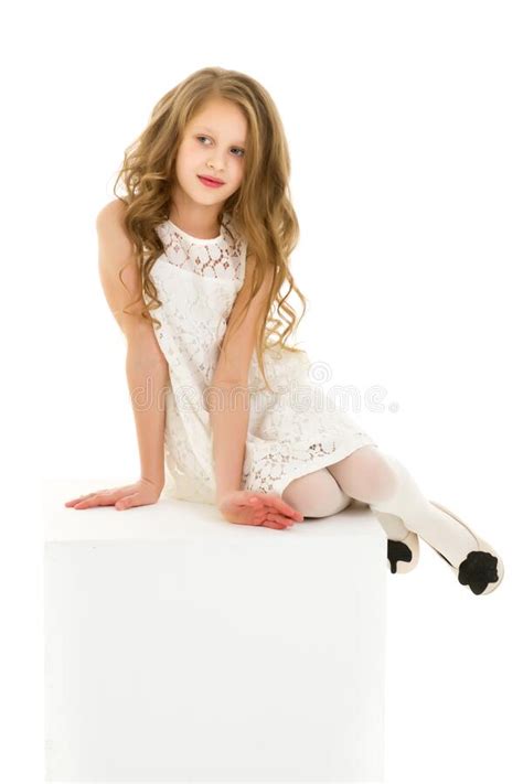 Beautiful Girl Wearing Elegant White Lace Dress Sitting On Stair Stock