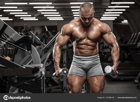 Muscular Man Working Out In Gym Doing Exercises Strong Male Naked Torso Abs Stock Photo By