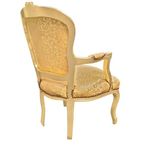 Choose from luxurious upholstery, sleek metal bases, tapered legs & tufting. Baroque armchair of Louis XV style golden satin fabric and ...