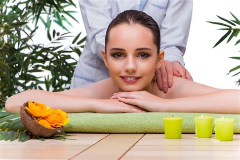 Premium Photo Woman During Massage Session In Spa Salon