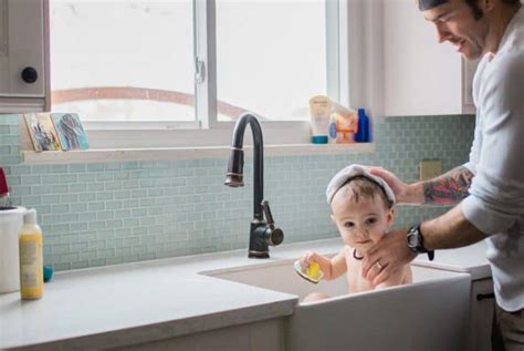 Baby In Kitchen Sink