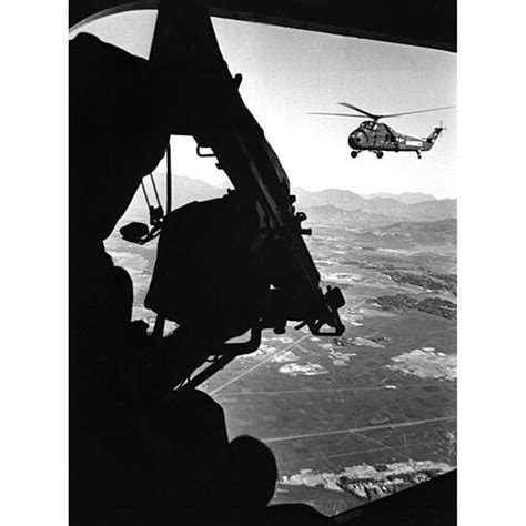 Buy Vietnam War Us Army Helicopter In Flight Viewed From Behind The