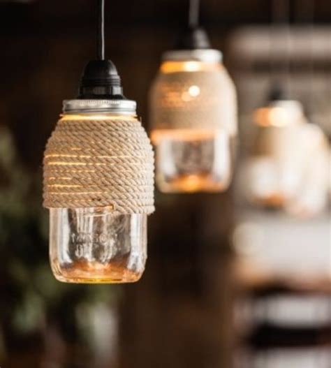 Here's a table lamp idea that has a really pretty and rustic vibe to it due to the birch wood used inside it! 15 Amazing DIY Mason Jar Lighting Projects You Can Easily Craft