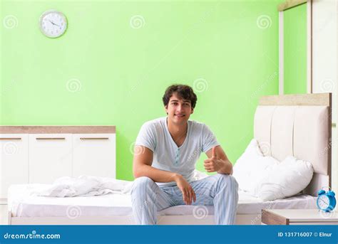 The Young Man Having Trouble Waking Up In Early Morning Stock Image