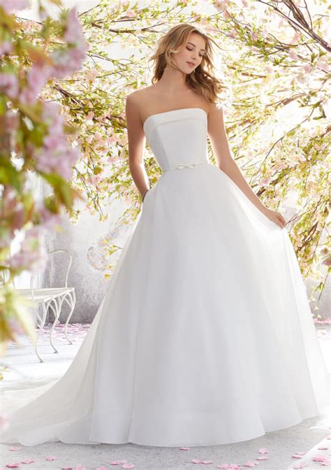 Create unforgettable memories in an elegant and stunning jovani wedding dress. Lucille Wedding Dress | Style 6897 | Morilee