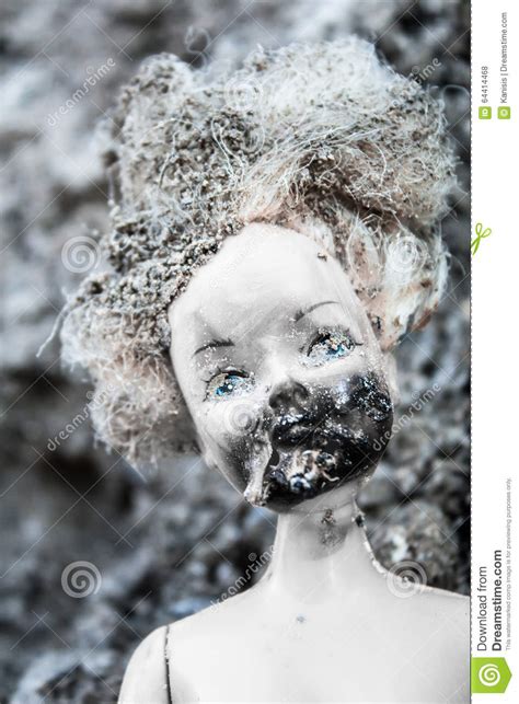 Melted And Burnt Face On Scary Girl Doll Stock Photo